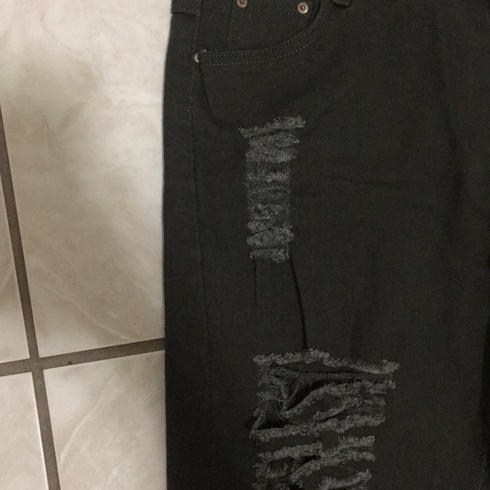 Destroyed olive green jeans